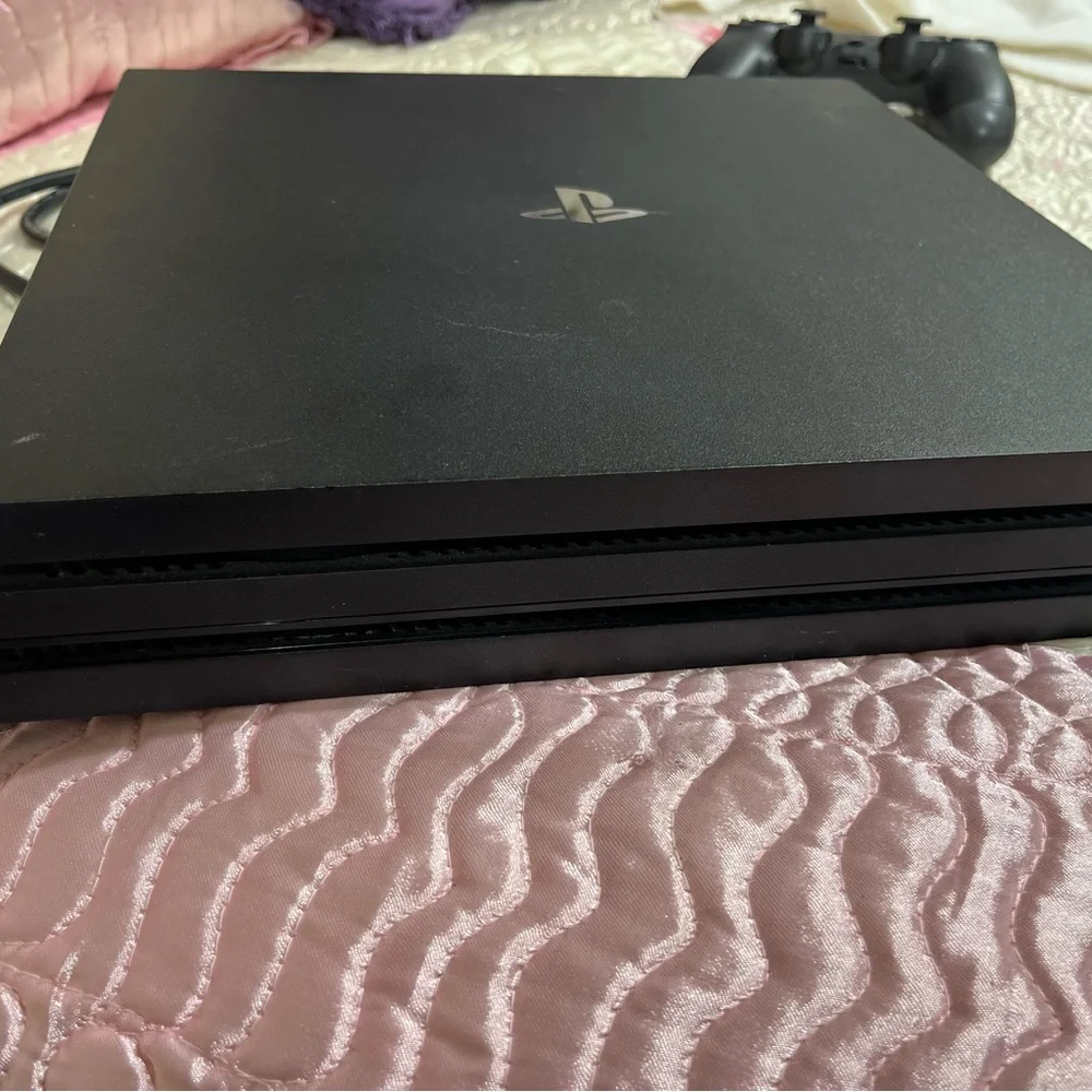 Sony PS4 Pro Console with DualShock Controllers - Black